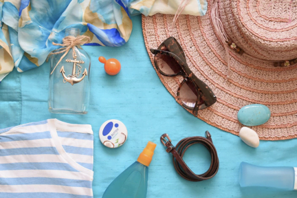 beach essentials including sunscreen for oily skin.